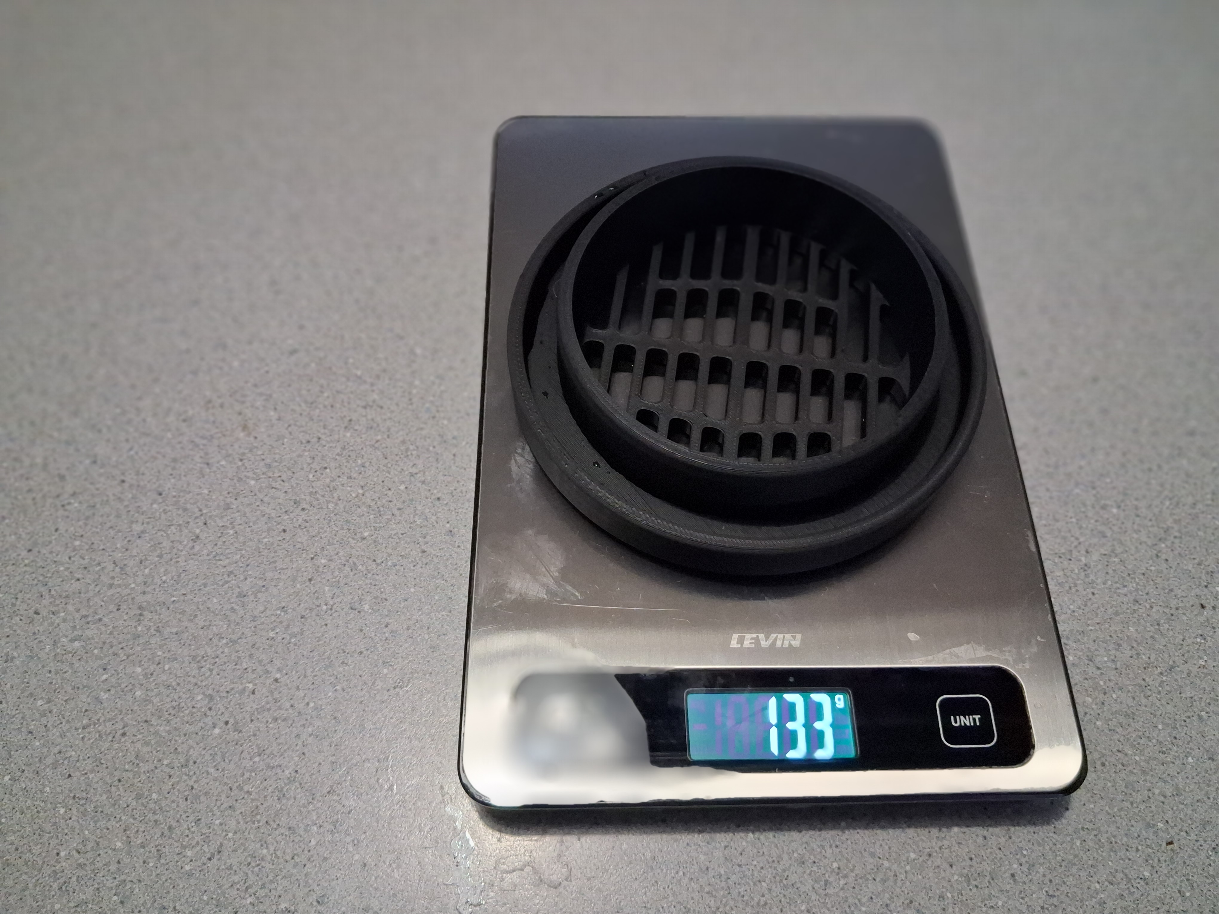 Product weight showing 133 grams on digital scale